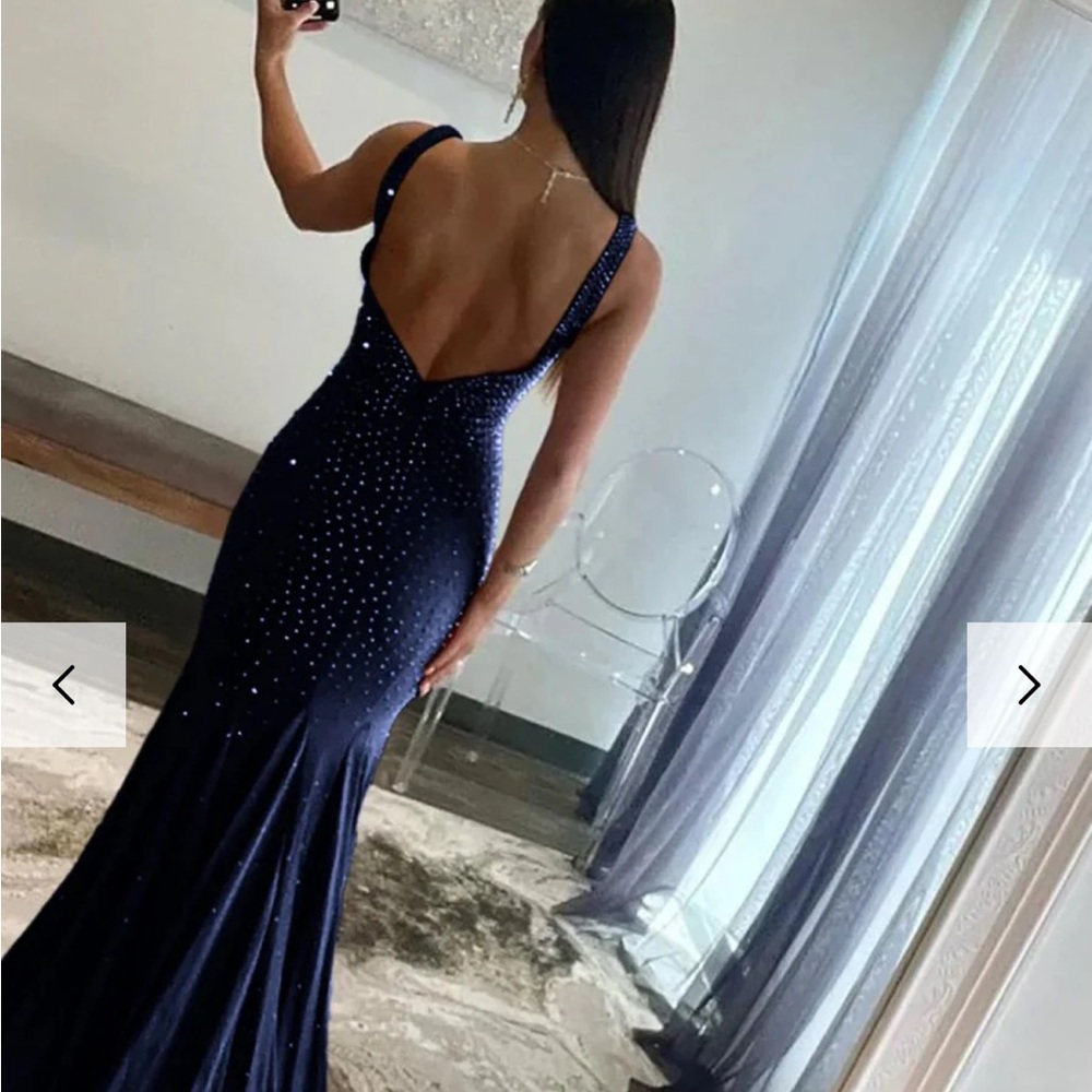 Elegant Navy Blue Evening Gown 
New With Tags
We missed the e return window.